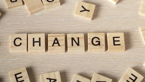 Scrabble letters spell out the word 'change'
