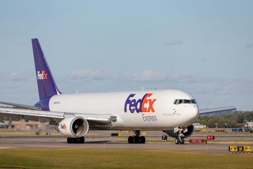 A fedex branded plane. Photo by Nick Morales on Unsplash