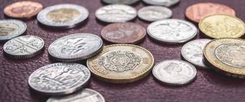 Pound coins on table