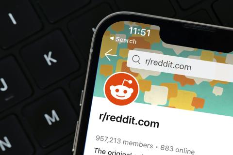 A smartphone showing the reddit homepage